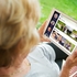 Person using oscar senior application on tablet